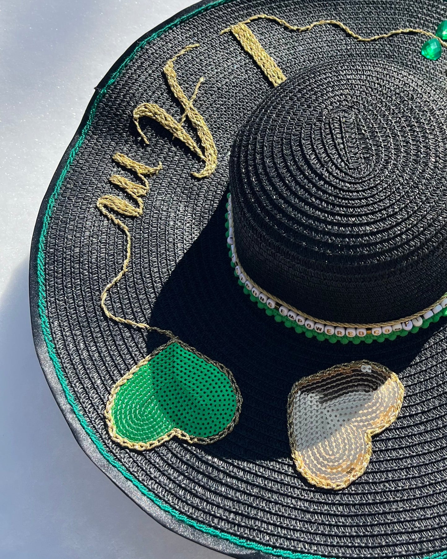 Manifest Hat luxury handmade hat photographed in winter snow