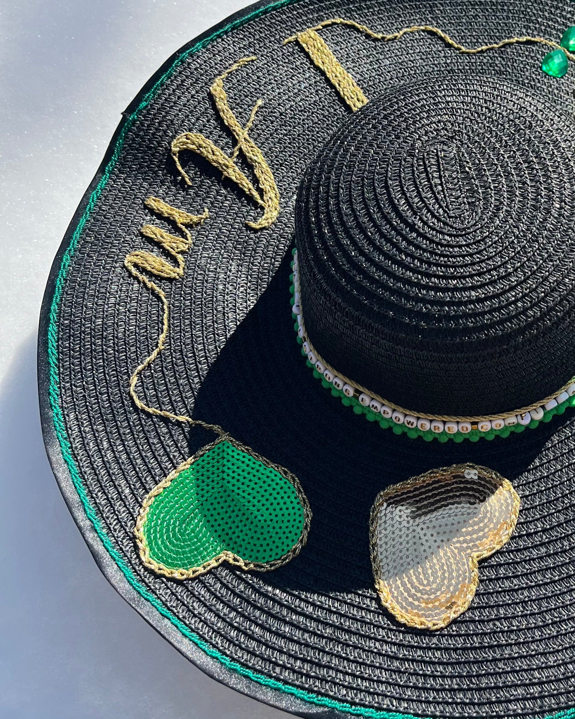 Manifest Hat luxury handmade hat photographed in winter snow