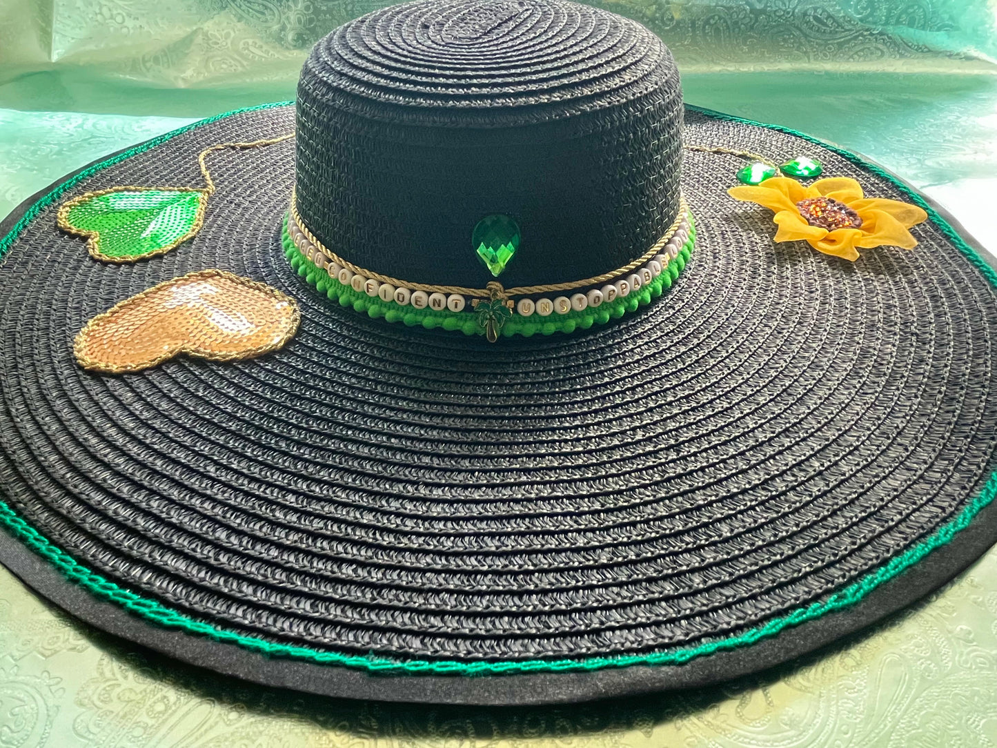 Hand embroidered affirmation detail on Manifest Hat